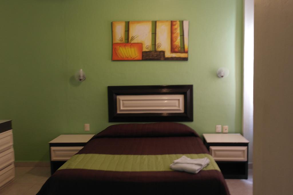Hotel El Roble Tuxtla Gutiérrez Rum bild